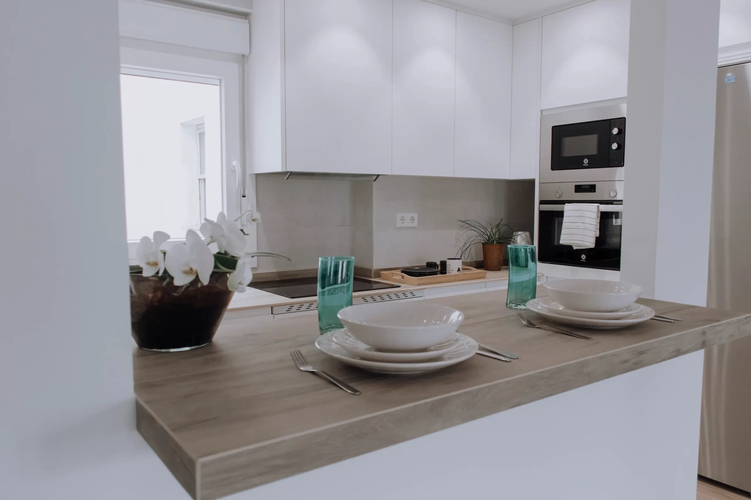 Cocina reformada con barra